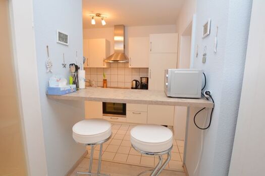 Bistrotisch mit Barhockern