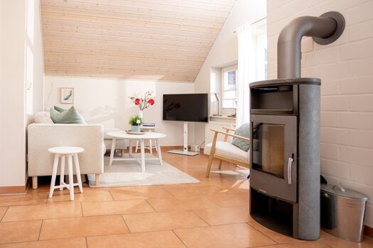 Fischerliesel Greetsiel - Wohnbereich mit Kamin