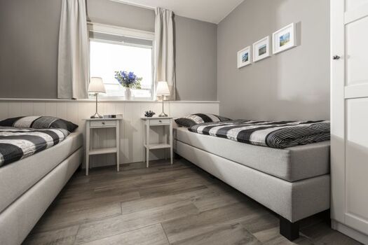 2 einzelne Boxspringbetten im 2. Schlafzimmer