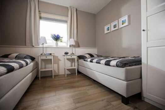 Auch im 2. Schlafzimmer erwarten Sie hochwertige Boxspringbetten