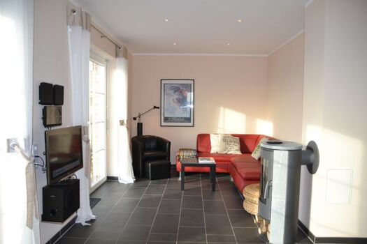 Wohnbereich Ferienhaus Lüttet Strandhuus in Kalifornien an der Ostsee