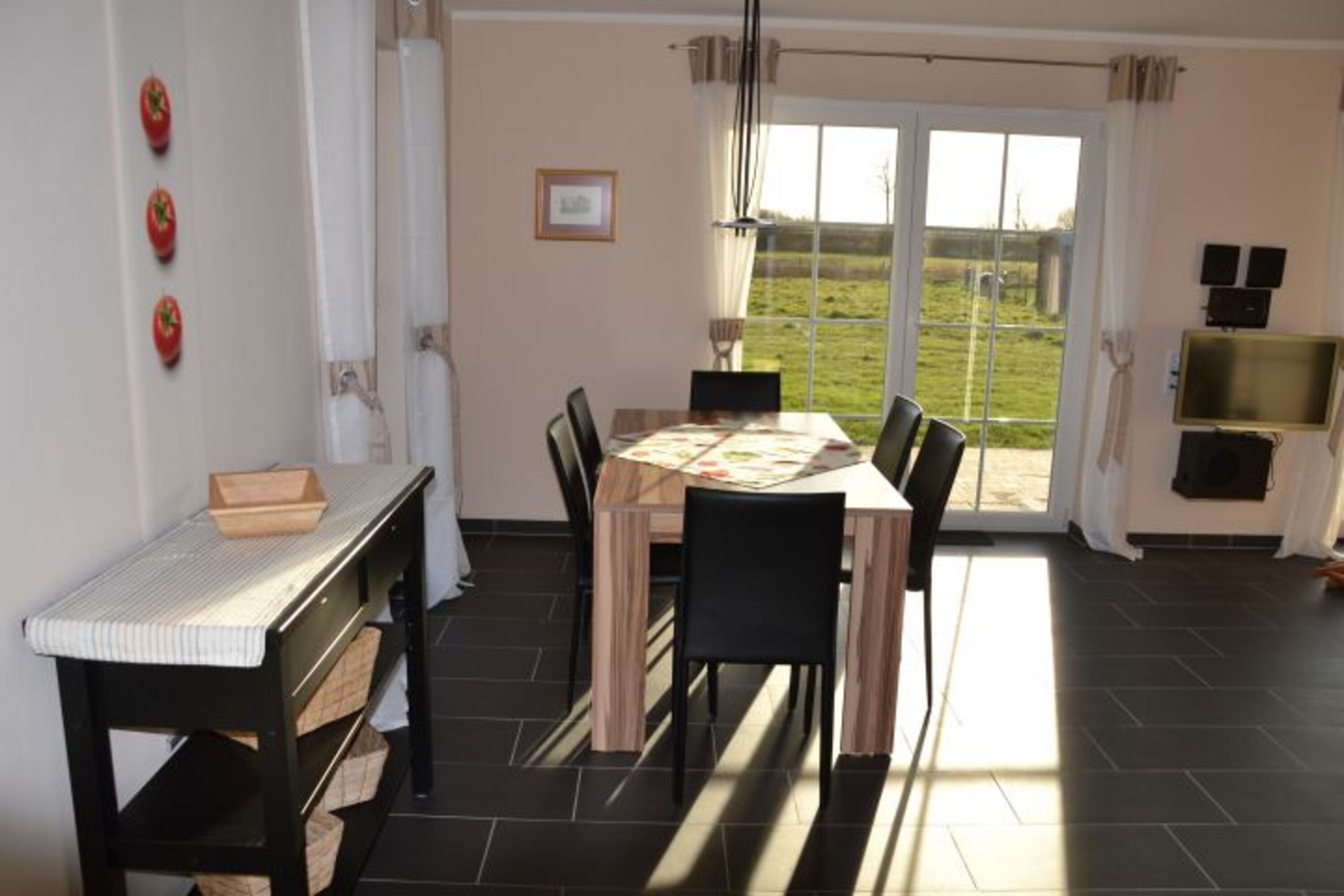 Essbereich Ferienhaus Lüttet Strandhuus in Kalifornien an der Ostsee