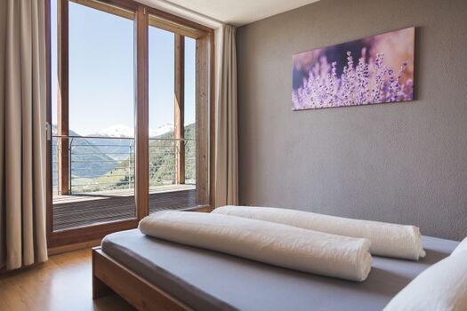 Ferienwohnung AVIUNSHOF Schlafzimmer mit Balkon