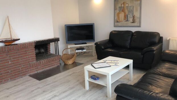 Wohnbereich mit offenem Kamin