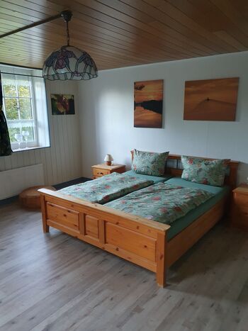 Schlafbereich mit Doppelbett (1,80 × 2,00)