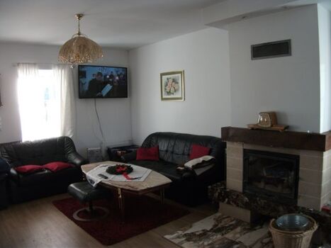 Wohnzimmer mit Kamin