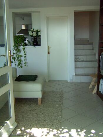 zu den Schlafräumen