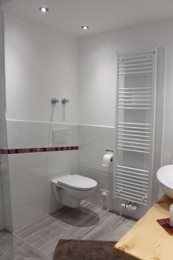 Handtuchheizkörper und Fußbodenheizung