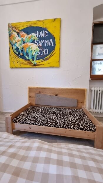 Und auch für den Hund gibt es ein gemütliches Hundebett