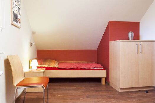 Schlafzimmer im Obergeschoss mit 2 Einzelbetten