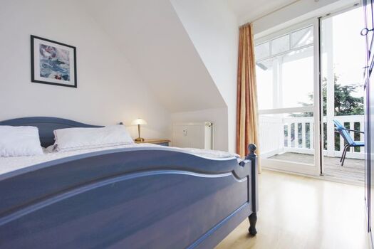 Schlafzimmer mit Doppelbett