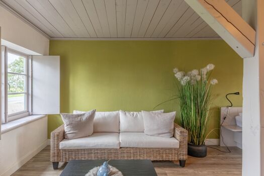 Reethus Koldenbüttel - Schlafzimmer mit eigenem Sofa 