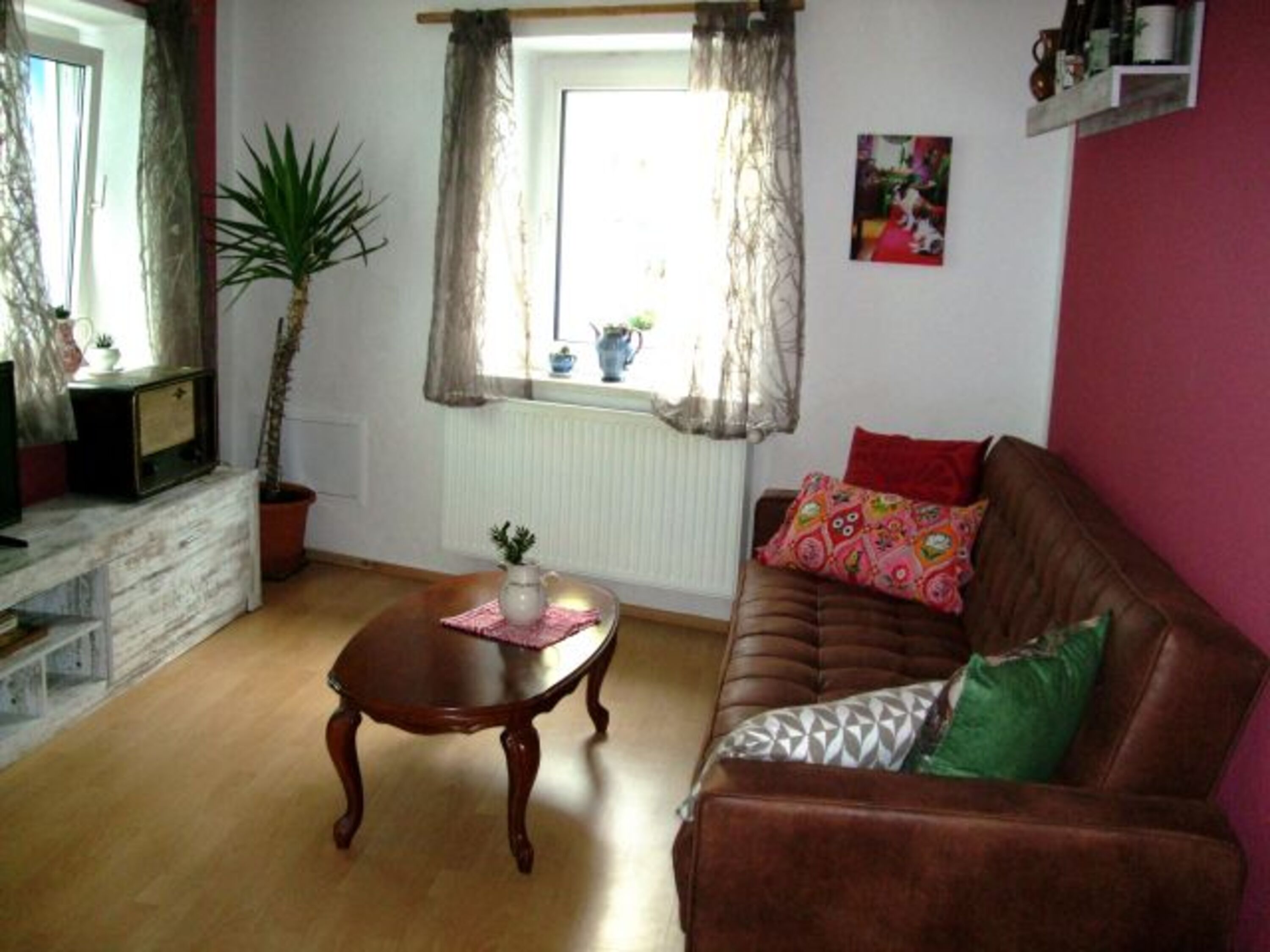 Wohnzimmer mit ausziehbarer Couch