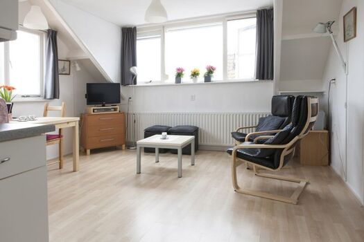 Sitzecke mit Fernseher 