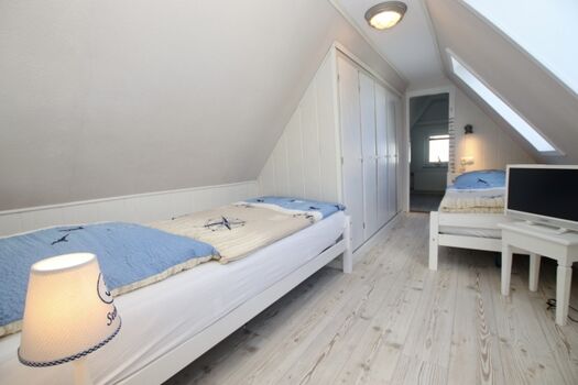 Das 2. Schlafzimmer im OG mit Einzelbetten