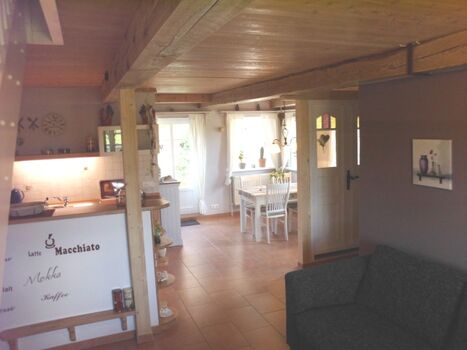 Wohnzimmer mit Küche