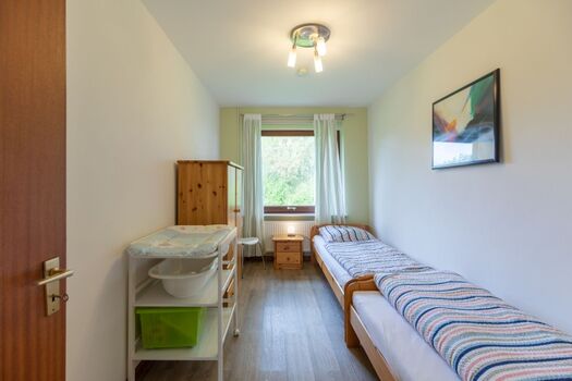 Haus am Deich - Schlafzimmer mit zwei Einzelbetten 