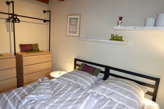 Die beiden Einzelbetten sind als Doppelbett zusammen geschoben