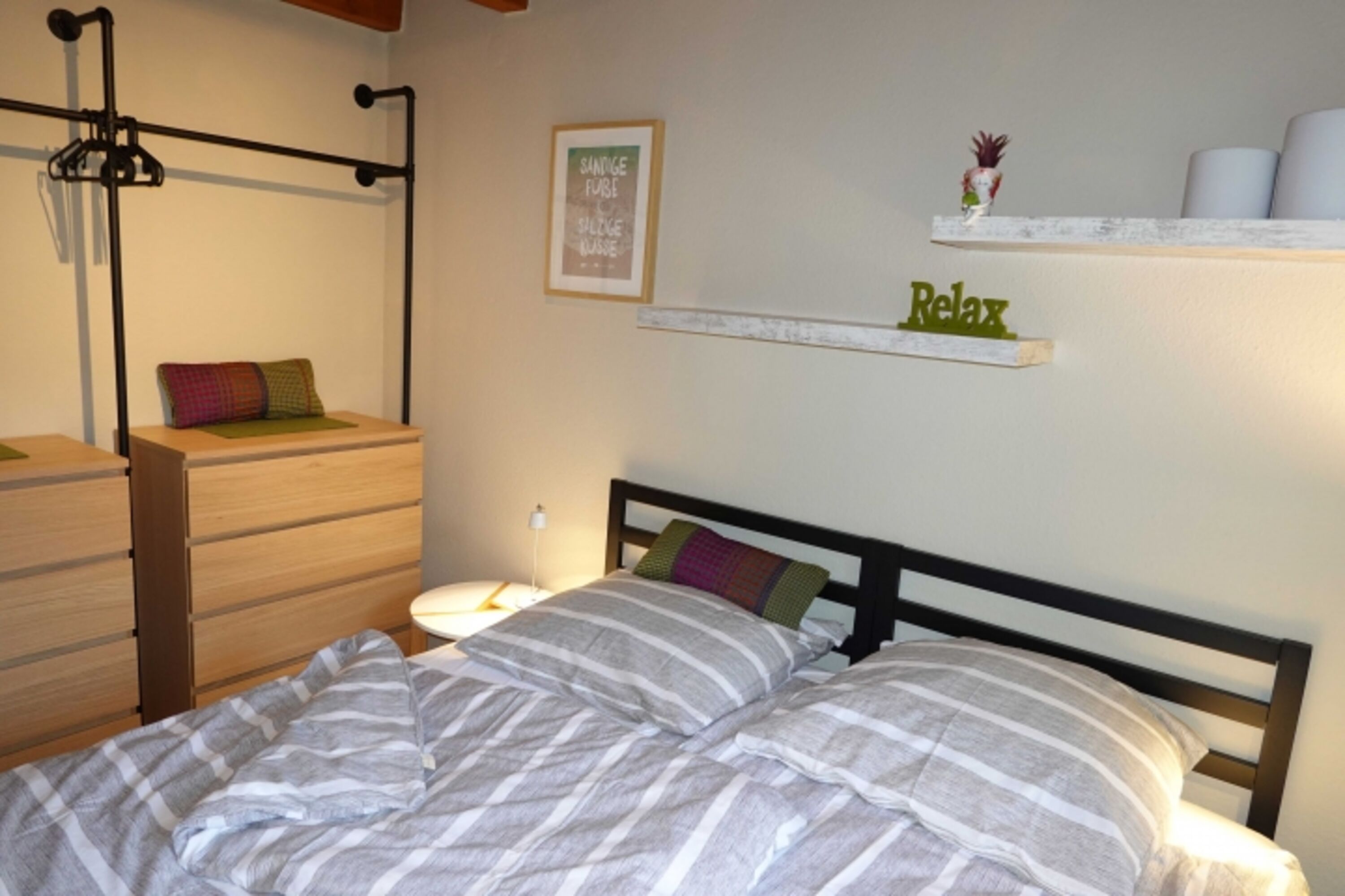 Die beiden Einzelbetten sind als Doppelbett zusammen geschoben