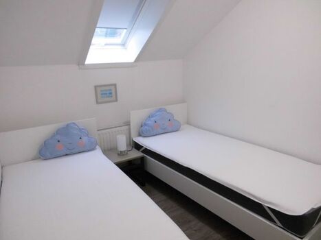 Schlafraum mit zwei Einzelbetten