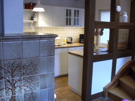 Kachelofen und Küche