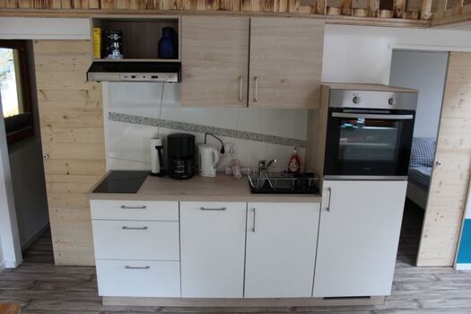 Die voll eingerichtete Küche lässt keine Wünsche offen