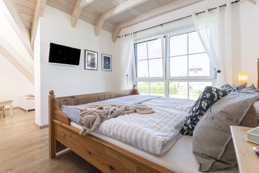 Schlafzimmer 2 im OG mit direktem Meerblick