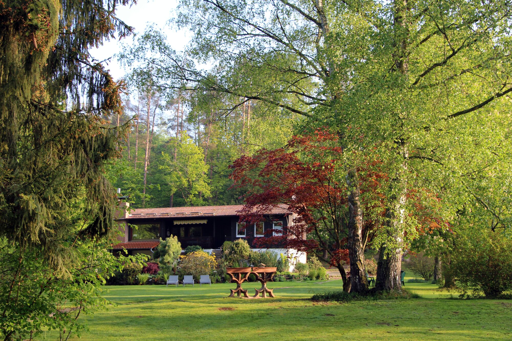 Ferienhaus Naturliebe - Haus und Gartenansicht
