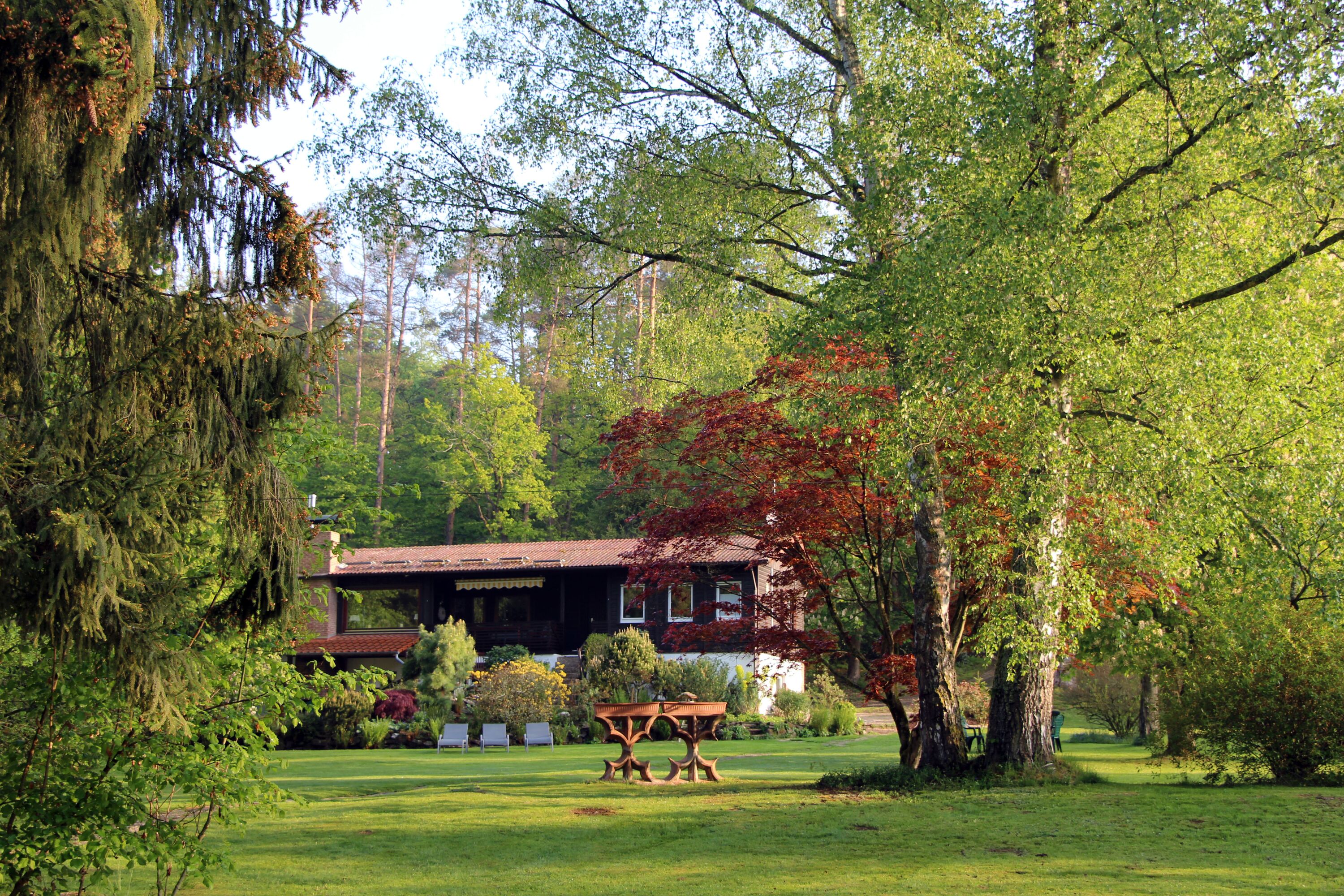 Ferienhaus Naturliebe - Haus und Gartenansicht