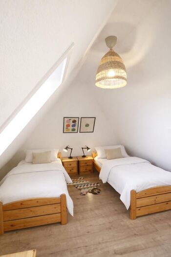 Schlafzimmer unter dem Dach