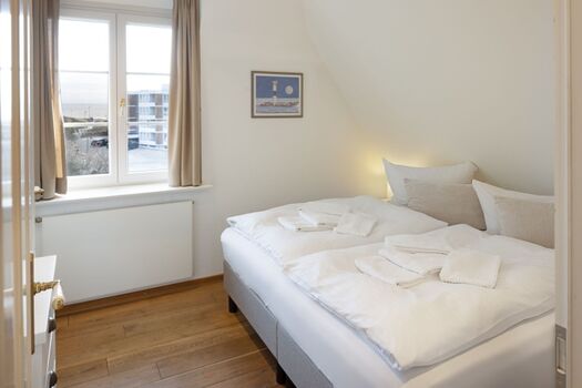 Schlafzimmer drei im OG mit Bad en Suite