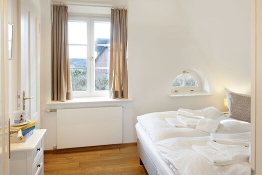 Schlafzimmer zwei im OG mit Bad en Suite