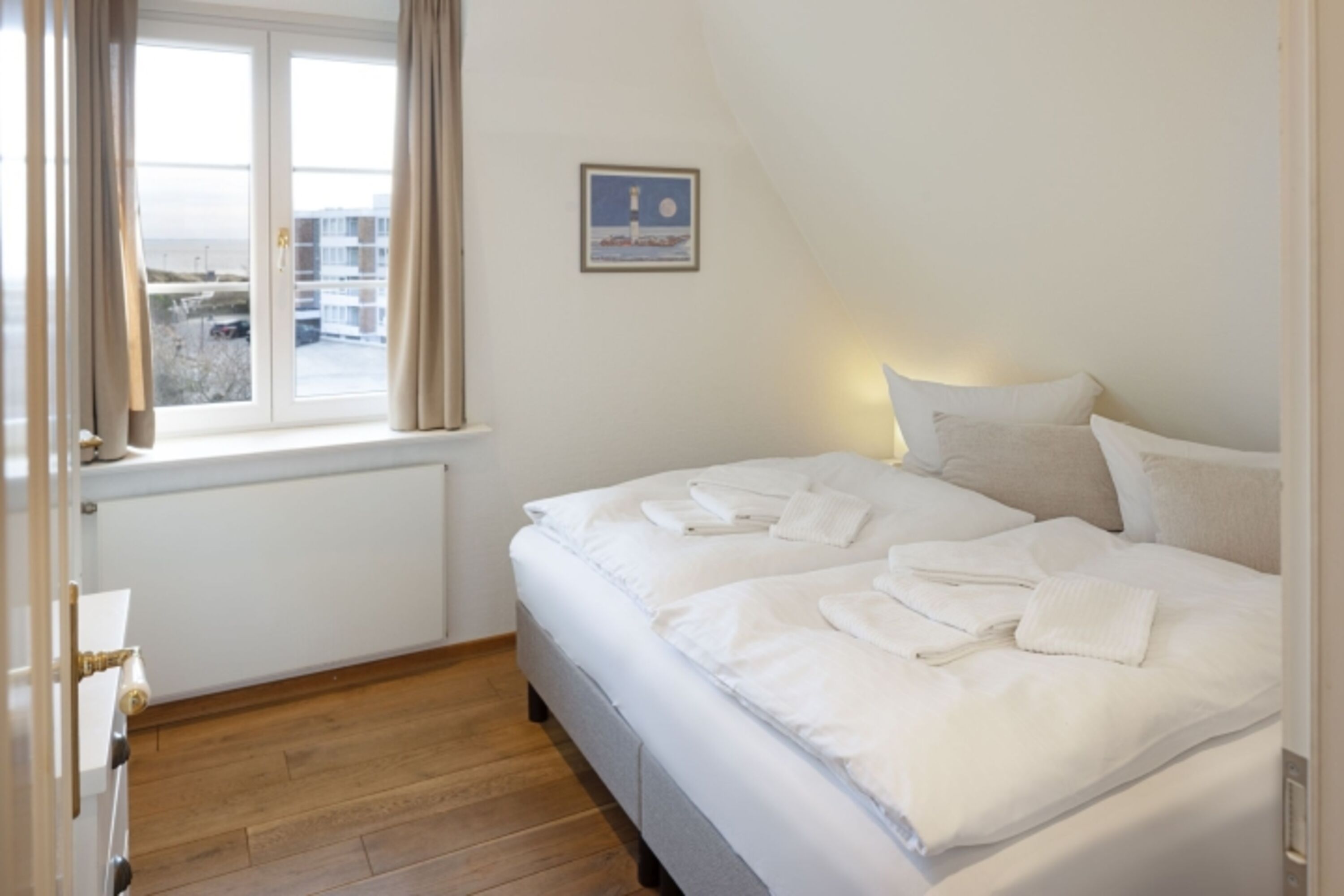 Schlafzimmer drei im OG mit Bad en Suite