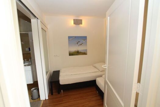 Schlafzimmer mit 2 Einzelbetten (Boxspring)