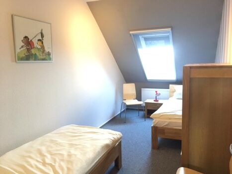 Schlafzimmer mit 2 Einzelbetten