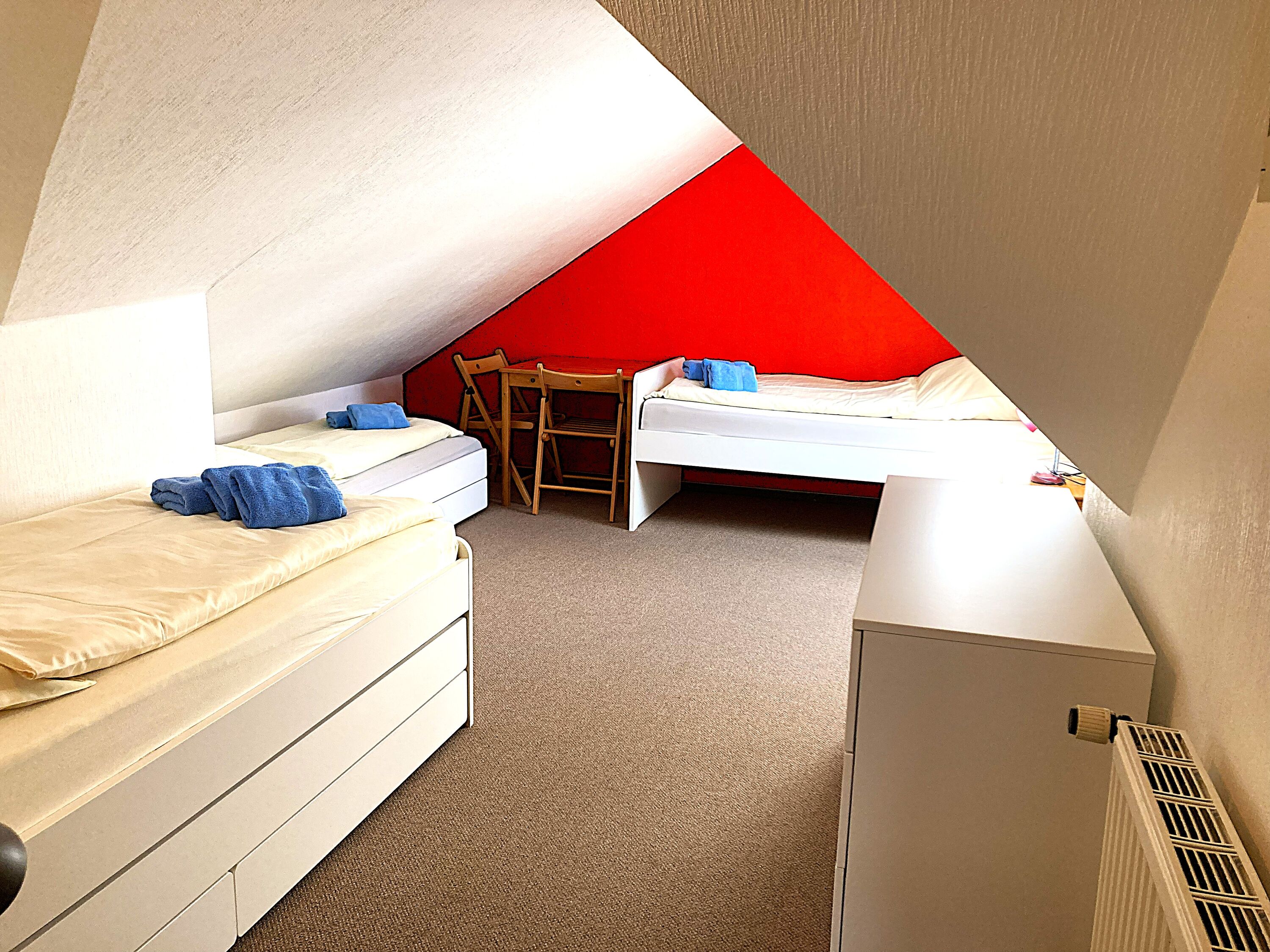 Schlafzimmer mit 2 oder 3 Einzelbetten