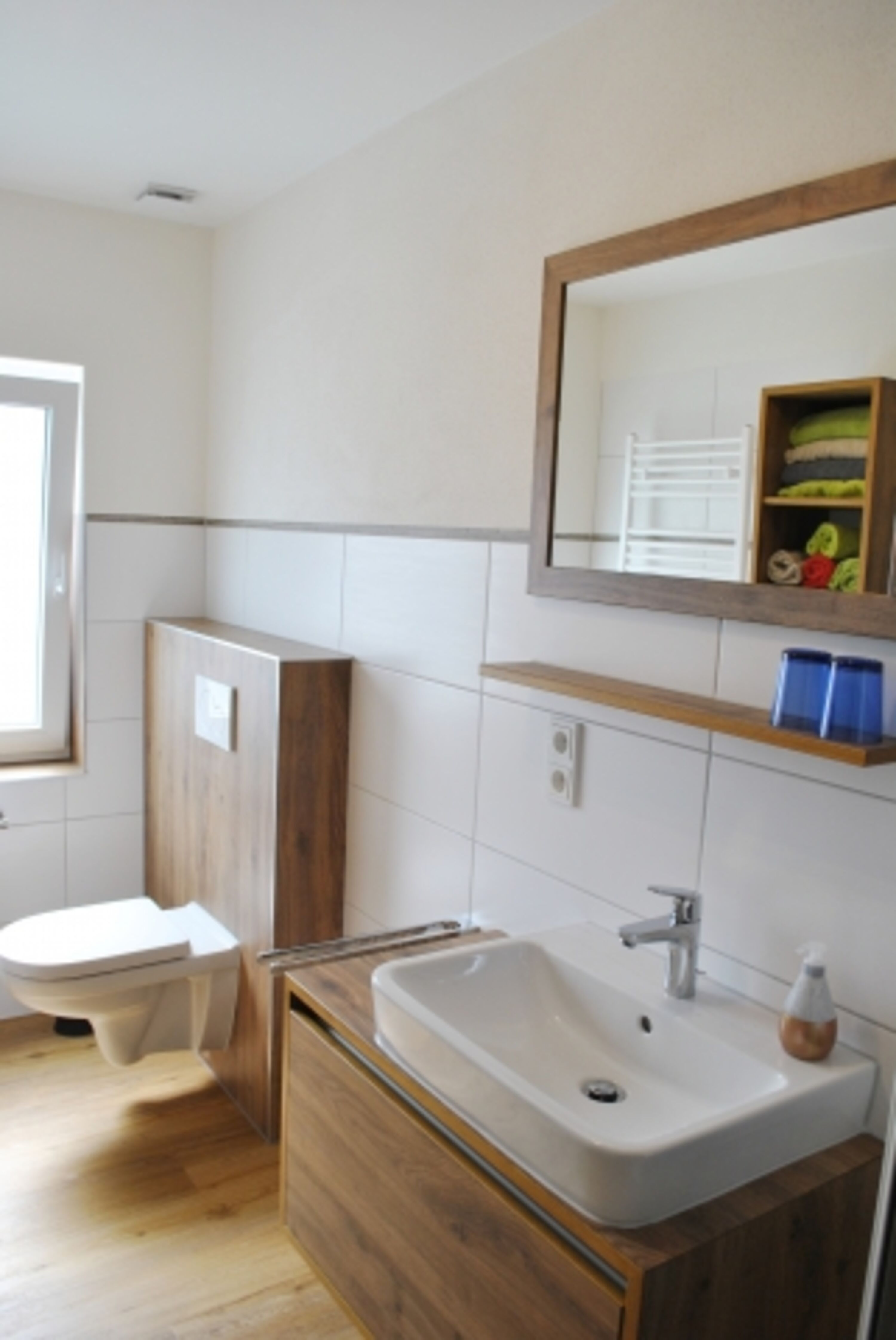 Bad mit Dusche und WC