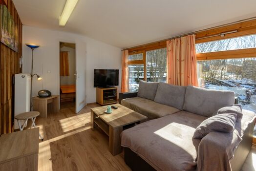 Ferienhütte Sonnenschein im Wintergarten Stil