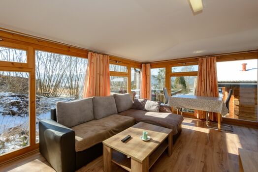 Ferienhütte Sonnenschein im Wintergarten Stil