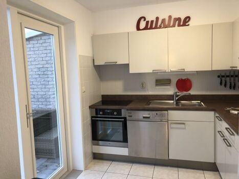 Sowie zusätzlicher Ausgang auf die überdachte Terrasse