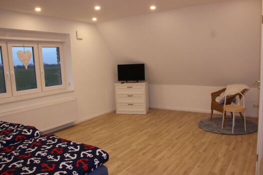 Großes Schlafzimmer im OG