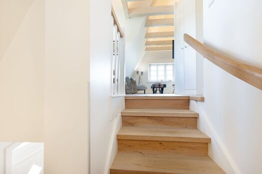 Treppe zum Appartement und Eingangsbereich