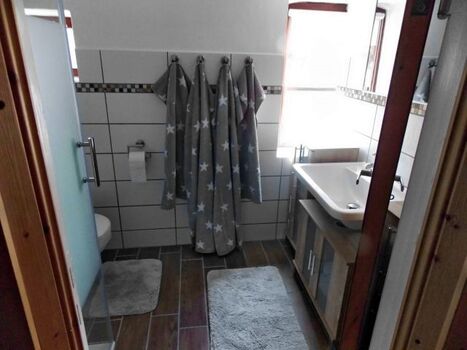 das Bad mit Fussbodenheizung