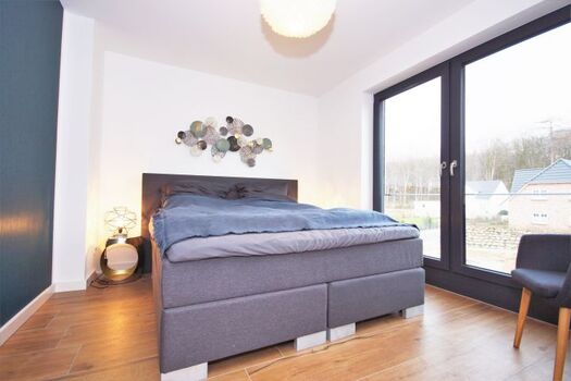 Schlafzimmer mit Doppelbett