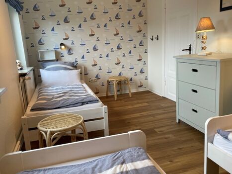 Schlafzimmer mit 3 Einzelbetten