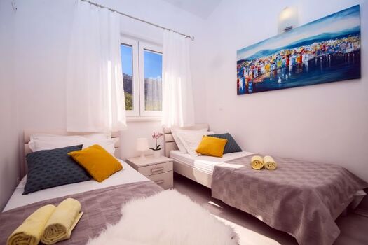 Schlafzimmer Nr. 3 mit zwei 90x200 cm Einzelbetten