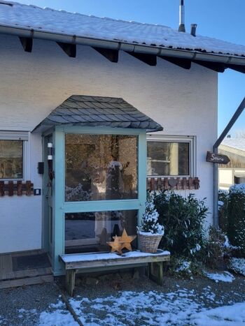 Hauseingang mit Windfang und Platz für Handtücher und Hundeleinen