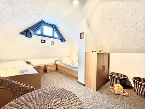 Gemütliches Schlafzimmer im DG