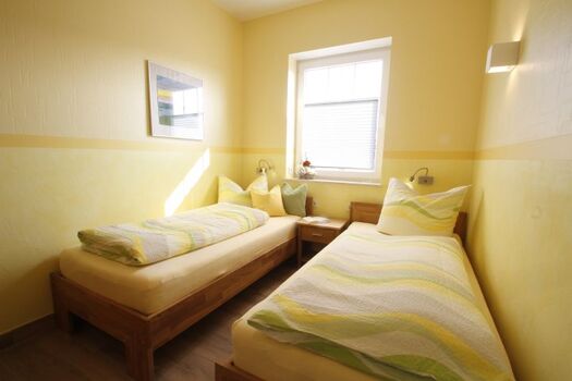 Schlafzimmer mit Einzelbetten