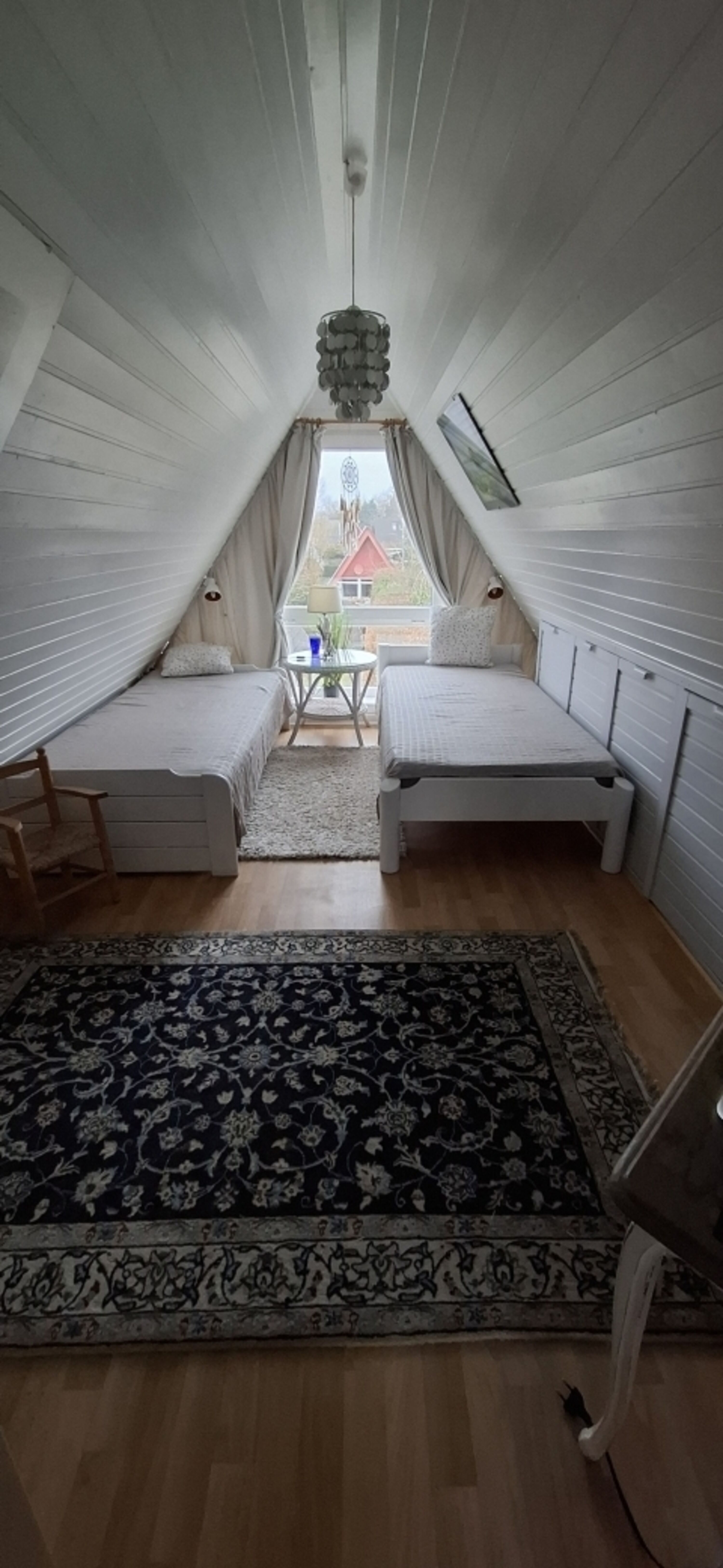Schlafzimmer unter dem Dach